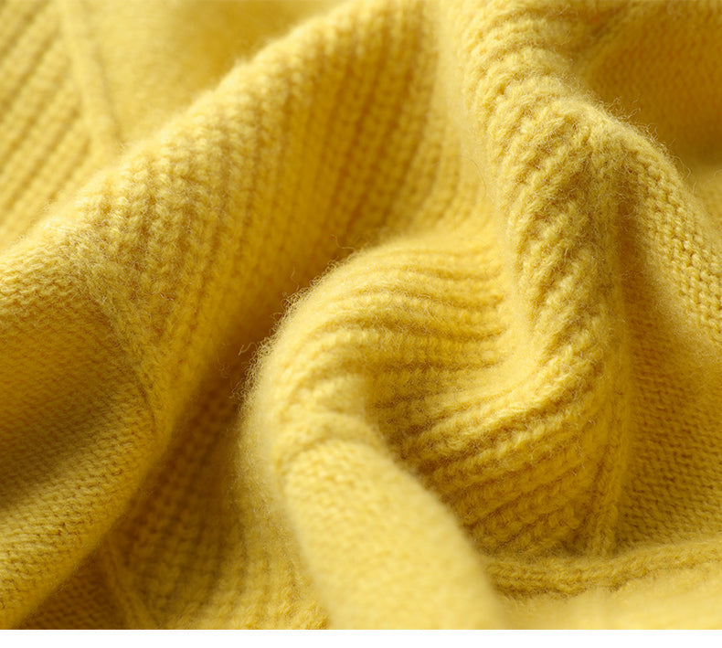 Versatile women's high neck sweater, geometric texture, great for casual or dressed-up styles.