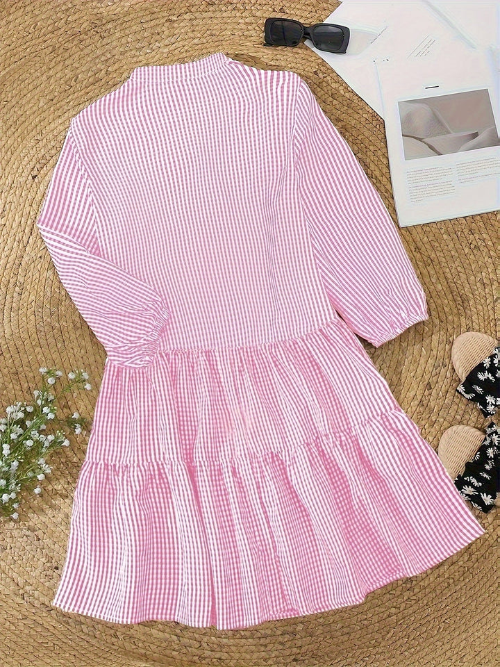 Women's mini summer dress in a classic gingham check, featuring a comfortable tiered design for daily wear.