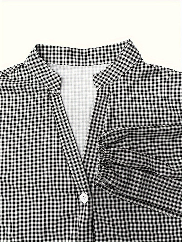 Stylish casual women's dress: a gingham tiered mini dress with puff sleeves and button-down front.