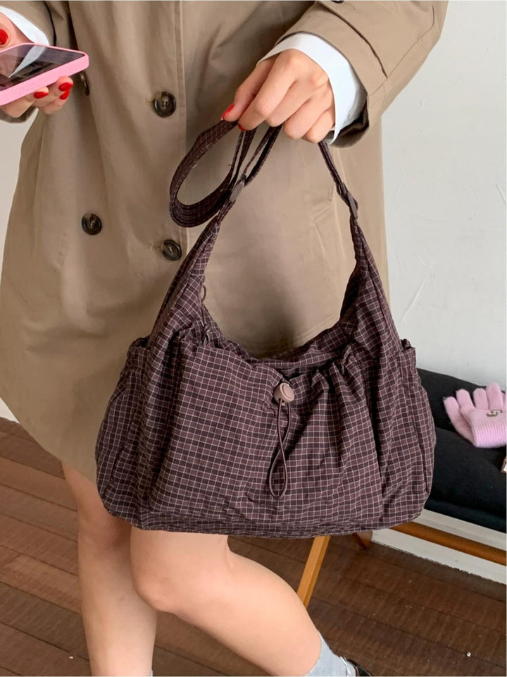 Versatile women's gingham cotton canvas handbag, easily transforms into an elegant shoulder bag.