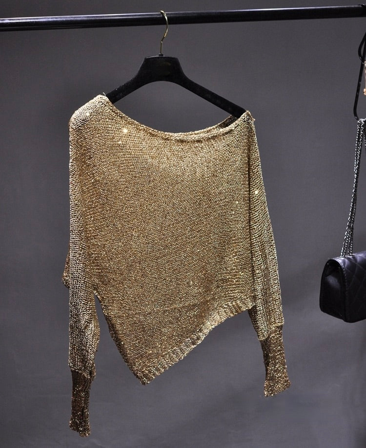 Women's glamorous asymmetric sequin blouse, perfect for dazzling party wear & special occasions. Elegant sparkle top.