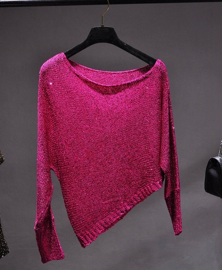 Elegant women's asymmetric sequin top for a dazzling sparkle. Perfect glamour blouse for fashion-forward party wear.