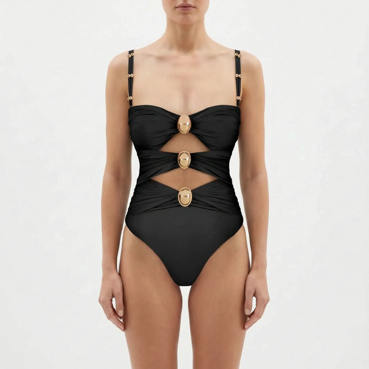 Glamorous women's monokini swimsuit by the pool. Perfect one-piece for luxurious resort wear.