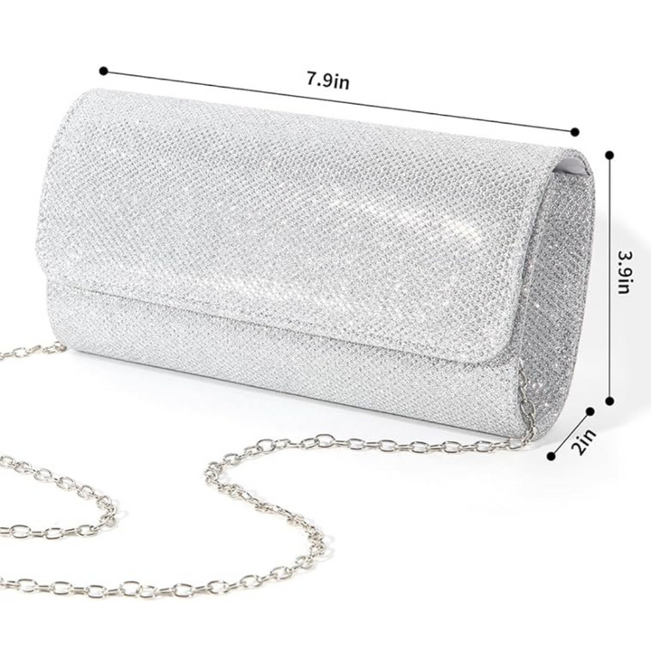 Close-up of Ramona glitter clutch showing shimmering texture, a glamorous evening bag
