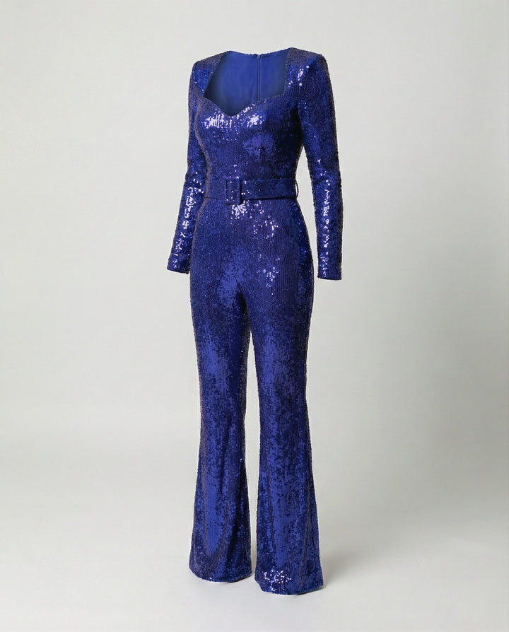Woman modeling an elegant long-sleeve sequin jumpsuit, a glamorous choice for formal party wear.