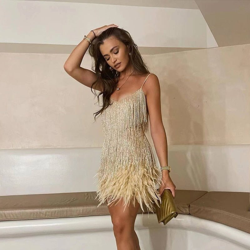 Glamorous women's sequin dance dress, short style with spaghetti straps & elegant feather detail.