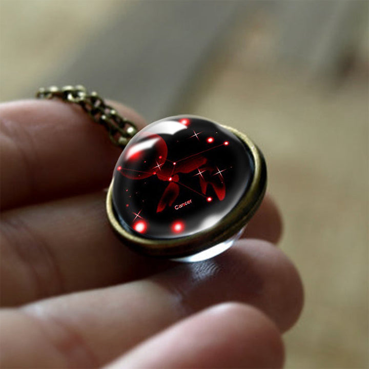 Detailed glass zodiac sign pendant. Women's celestial jewelry, a protective astrological amulet.