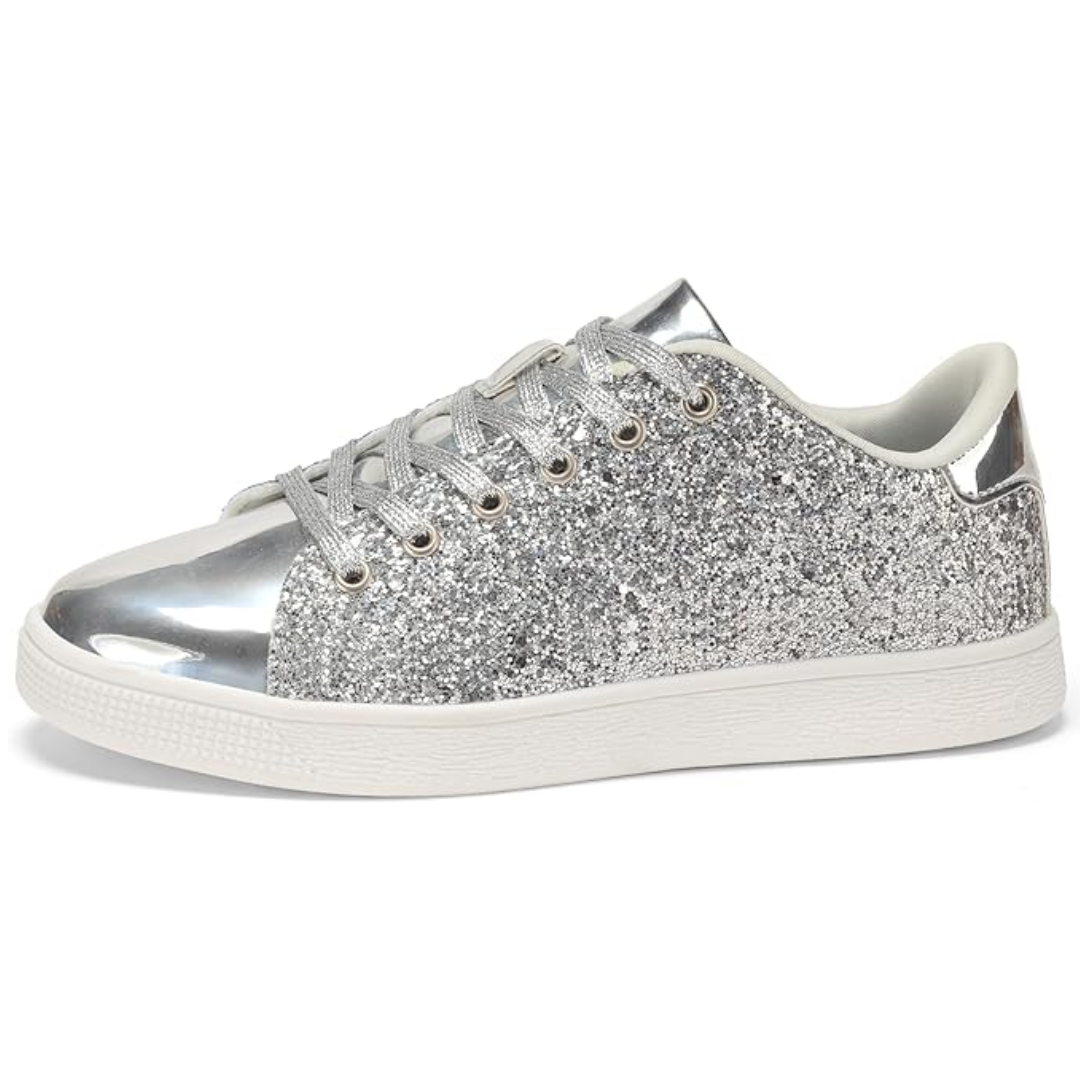 Detail of glitter texture on women's lace-up fashion sneakers, trendy flat shoes
