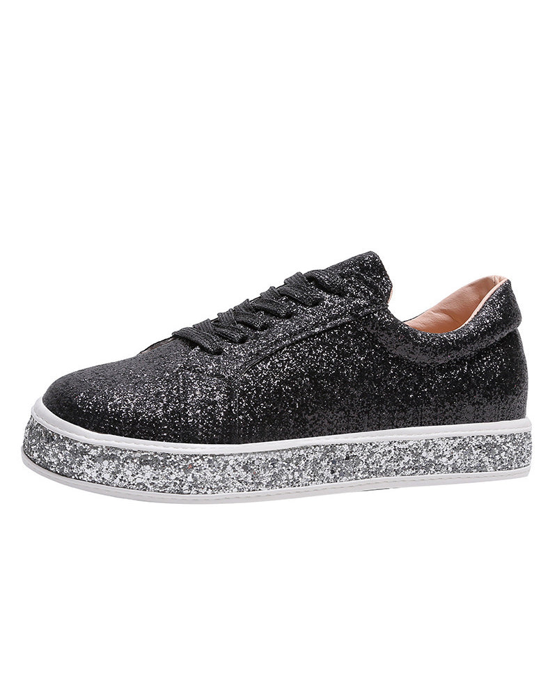 Dazzling women's sparkle platform sneakers, perfect for adding a glamorous touch to casual ensembles.