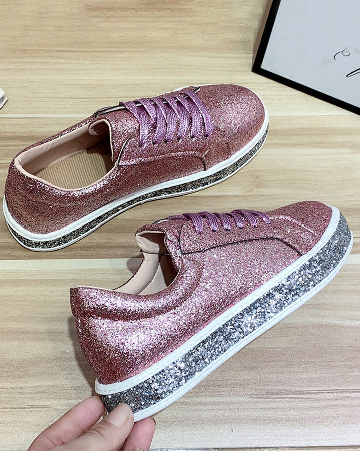 Fashion-forward women's platform sneakers with vibrant glitter, ideal for elevating any casual outfit.
