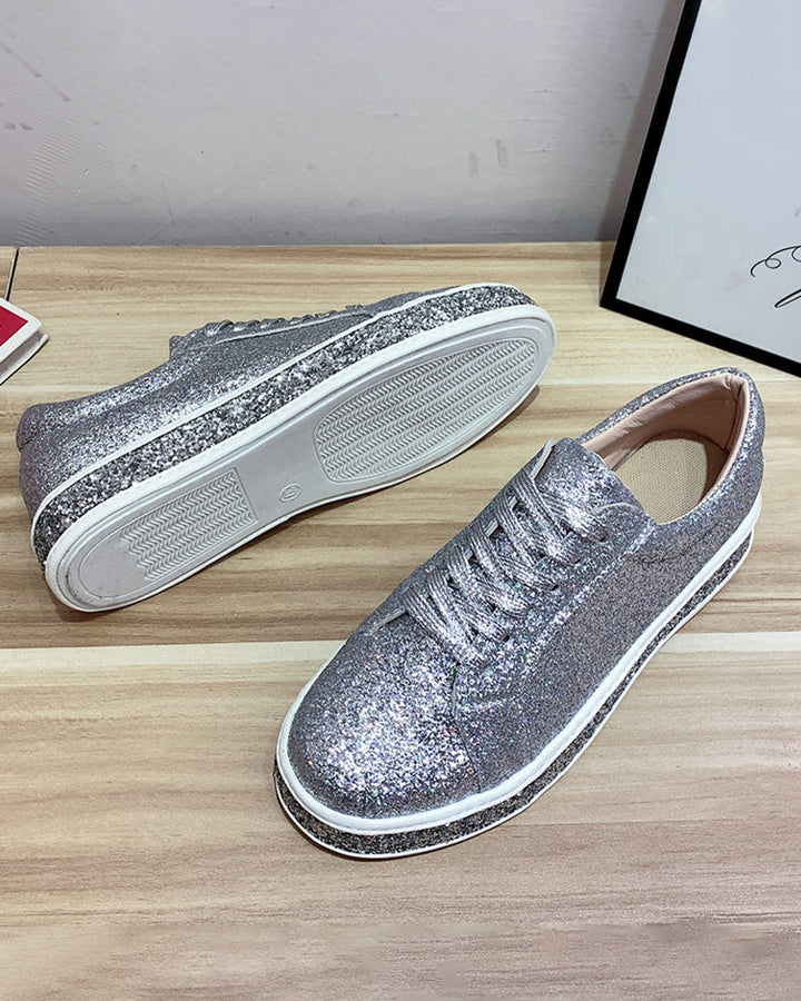 Versatile women's glitter platform sneakers, offering a comfortable fit and a touch of sparkle.