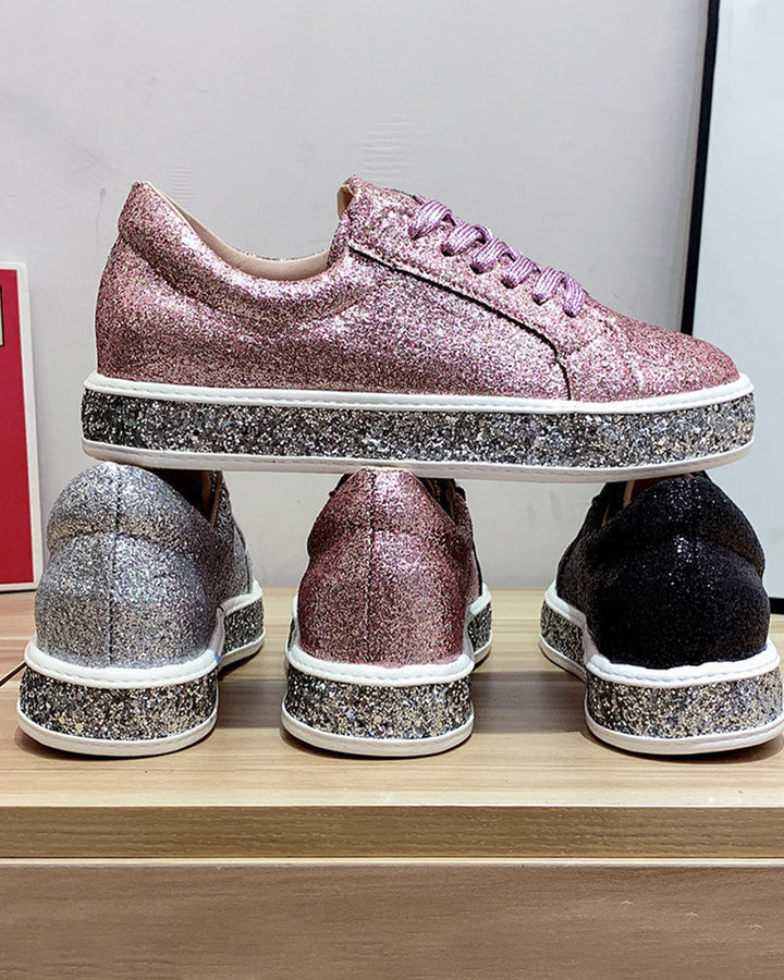 Silver women's glitter platform sneakers, designed for stylish everyday wear and modern street fashion.