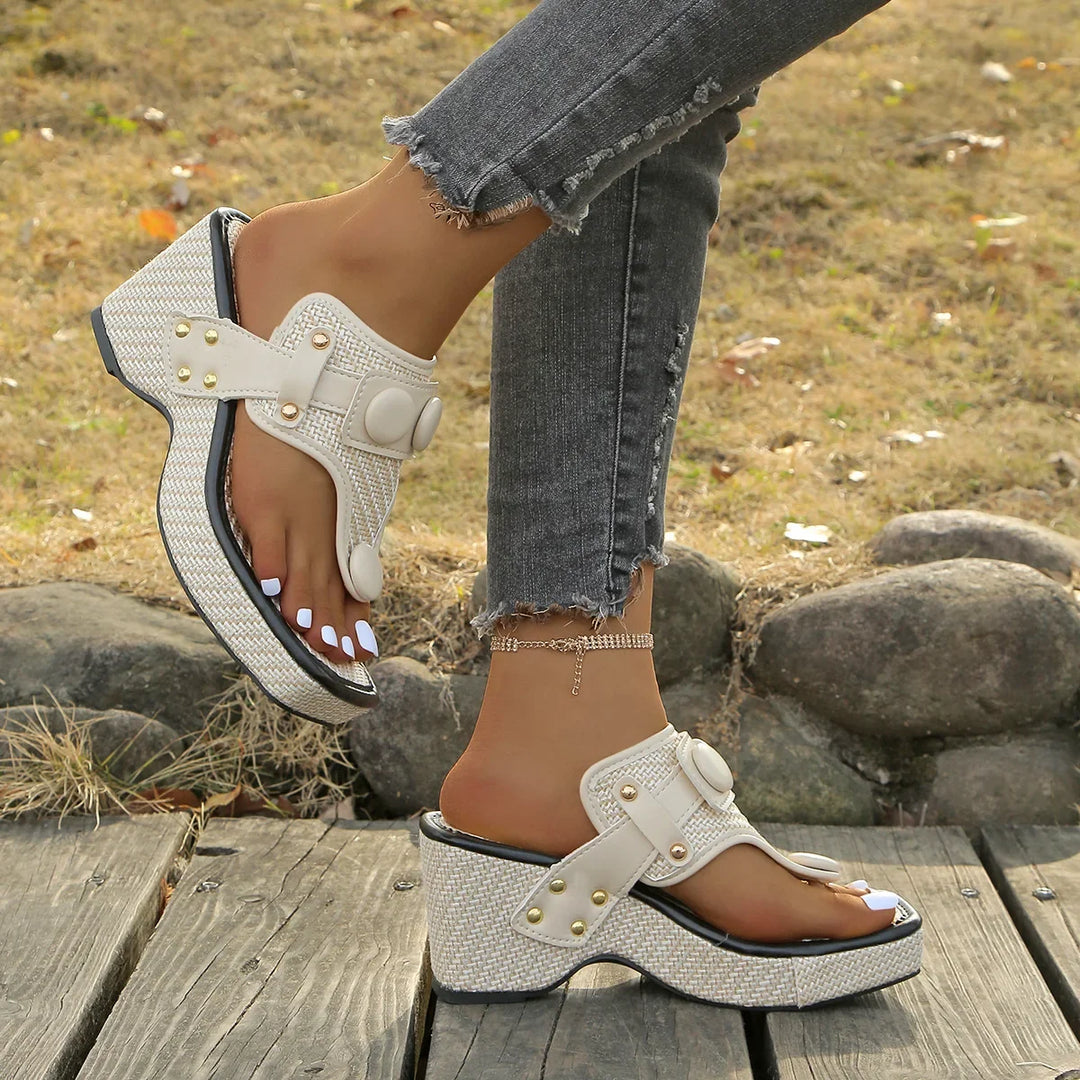 Glossy women's platform sandals. Slip-on, open-toe style for stylish summer footwear.