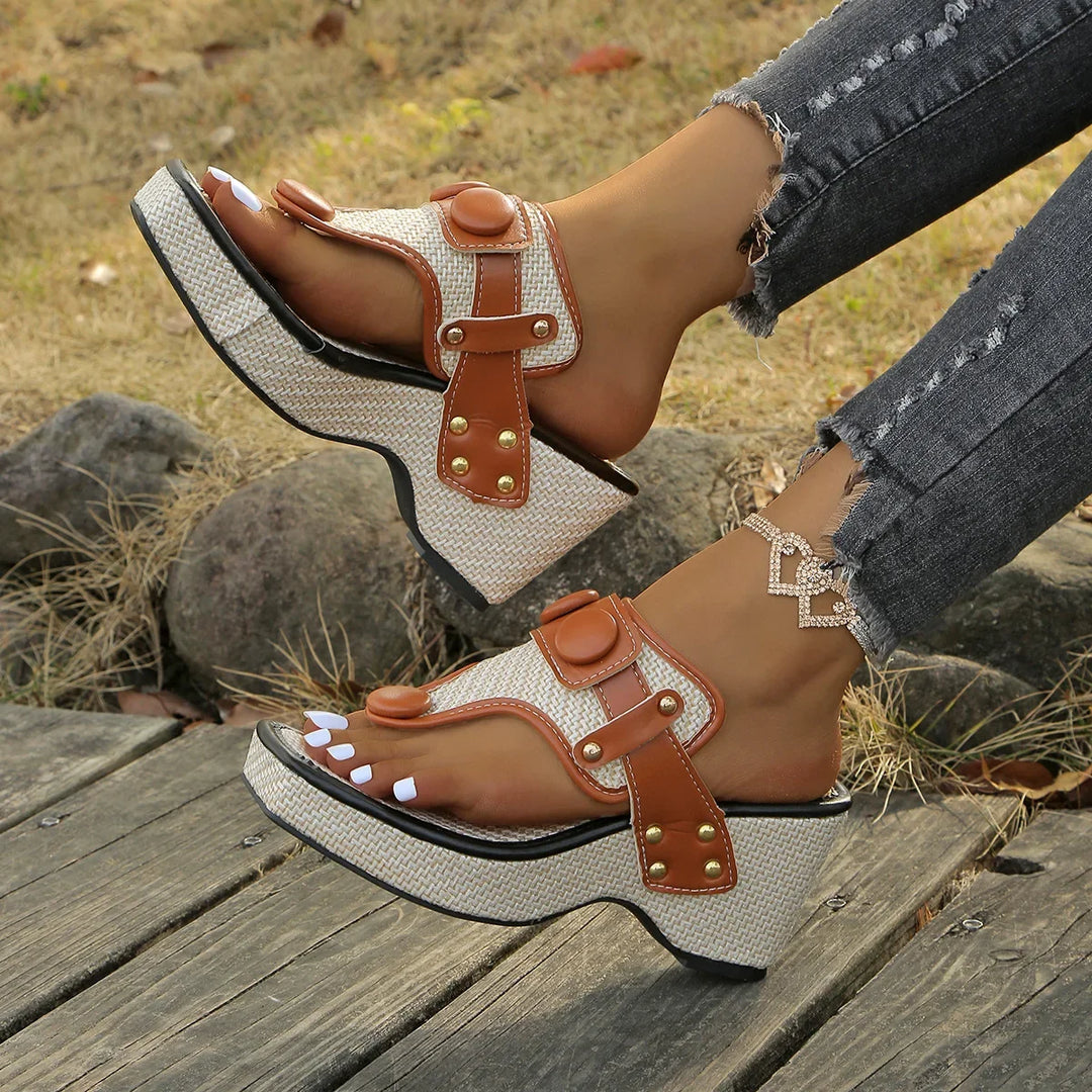 Women's gloss platform slip-on sandals. Ideal open-toe footwear for warm weather.