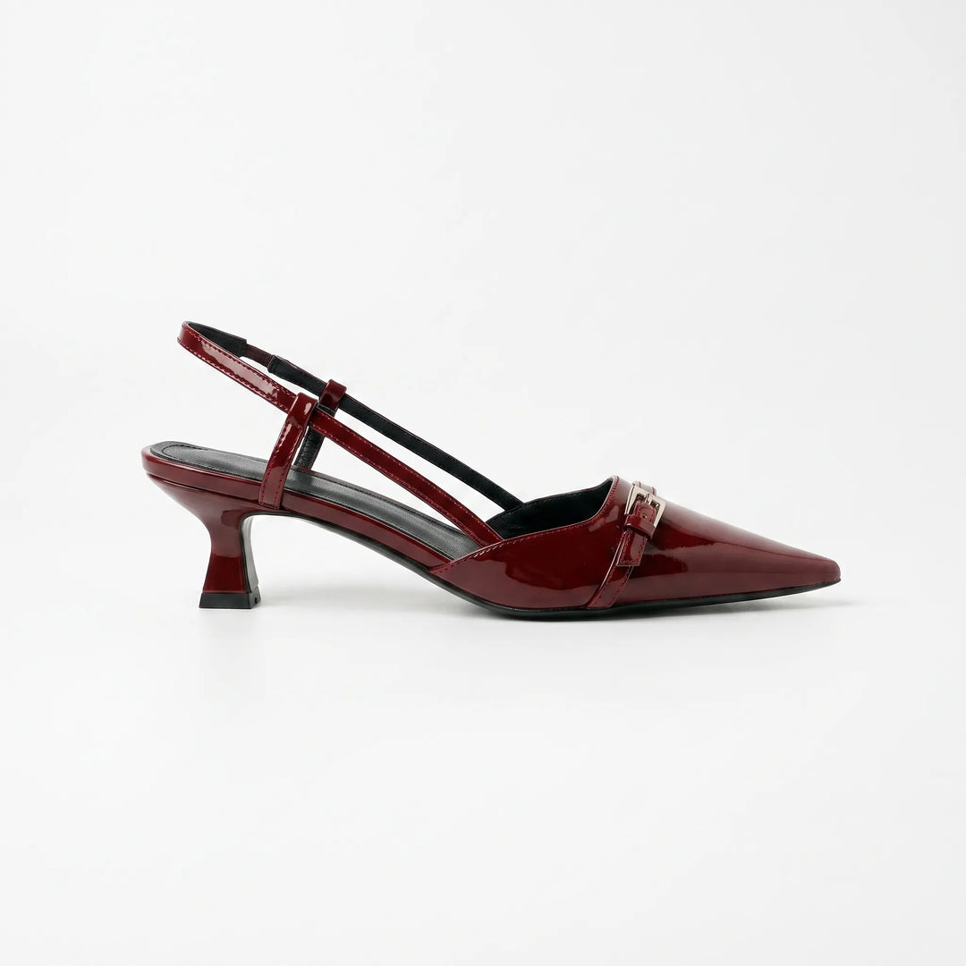 Elegant women's glossy pointed toe slingback kitten heels, ideal for evening or professional attire.