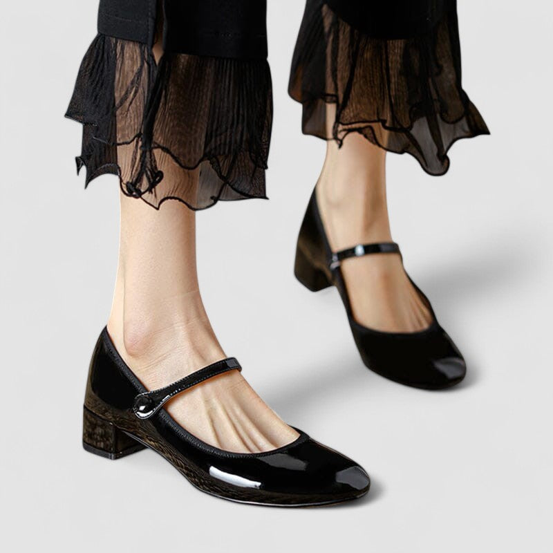 Women's glossy Mary Jane shoes with comfortable block heel & round toe for an elegant, classic look.