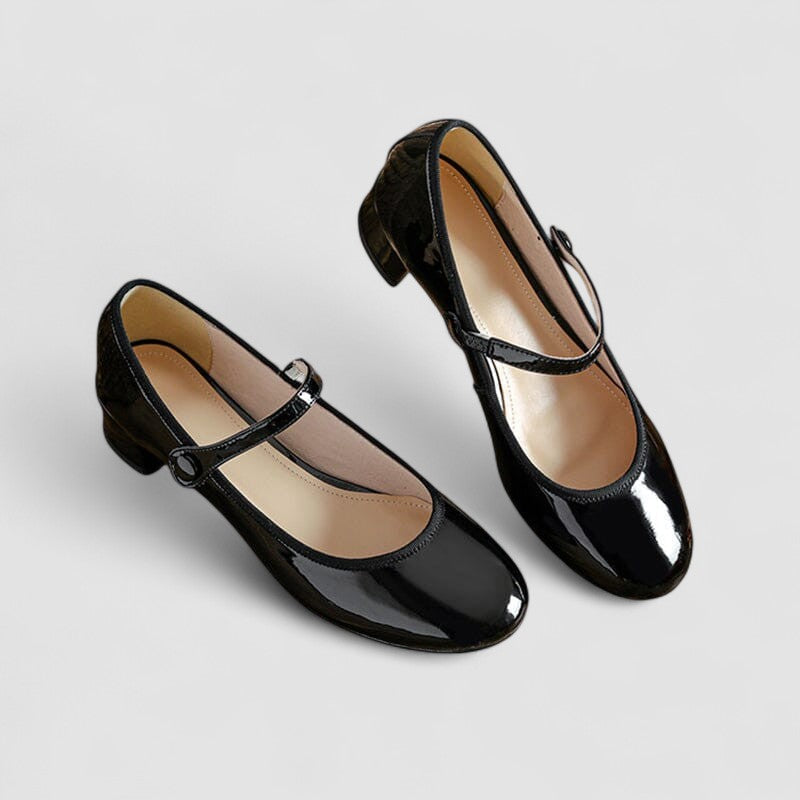 Women's elegant Mary Jane shoes with a glossy finish, comfortable block heel, and classic round toe design.