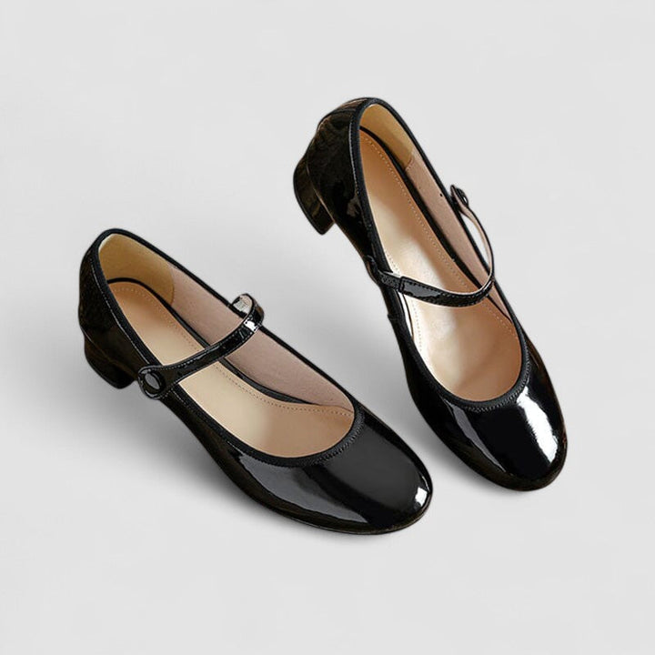 Women's elegant Mary Jane shoes with a glossy finish, comfortable block heel, and classic round toe design.