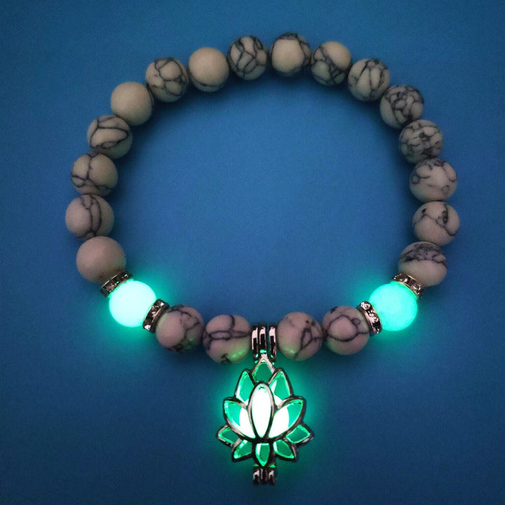 Unique women's glow-in-the-dark lotus bracelet, a stylish luminous charm jewelry.