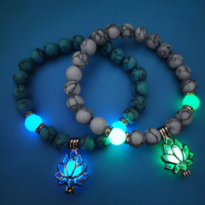 Elegant women's glow-in-the-dark lotus bracelet, a sophisticated luminous charm.