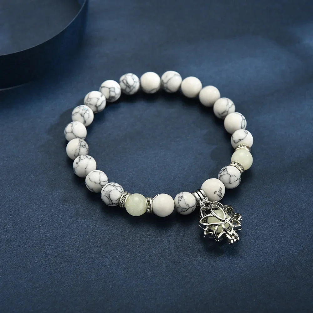 Women's glow-in-the-dark lotus bracelet, luminous elegant jewelry charm.