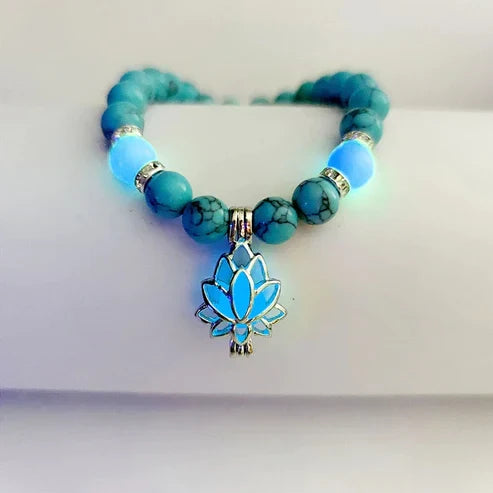 Luminous lotus flower bracelet for women, glowing in the dark, elegant fashion accessory.
