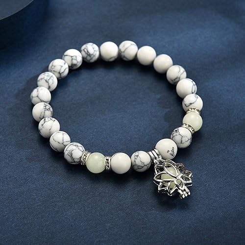 Beautiful women's glow-in-the-dark lotus charm bracelet, unique luminous accessory.