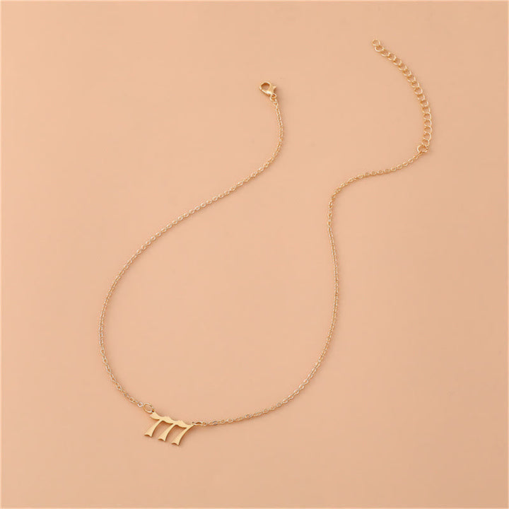 Gold-tone angel numbers necklace, stainless steel, women's symbolic spiritual jewelry.