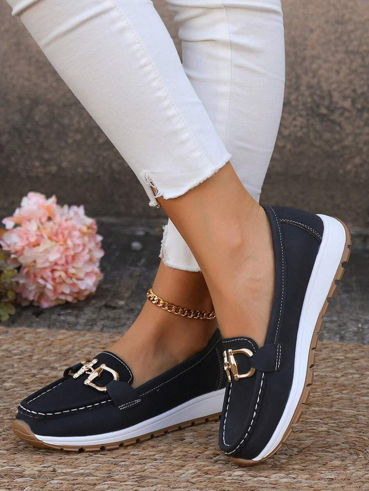 Stylish women's flatform loafers with gold chain accent. Round toe slip-on design for versatile everyday wear.