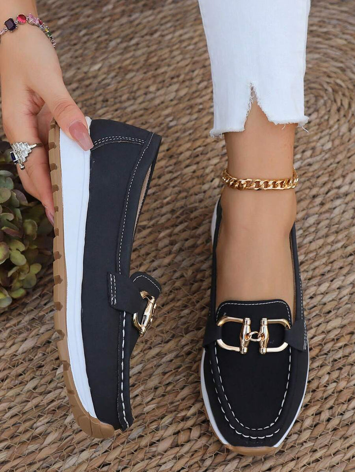 Gold chain flatform slip-on loafers for women. Comfortable, stylish, and versatile round toe everyday footwear.