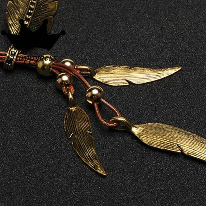 Chic gold feather pendant necklace for women. Stylish boho jewelry, a perfect accessory for casual and dressy occasions.