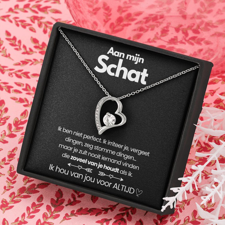 Shiny gold heart zirconia necklace, a perfect women's jewelry piece. Elegant and classic.
