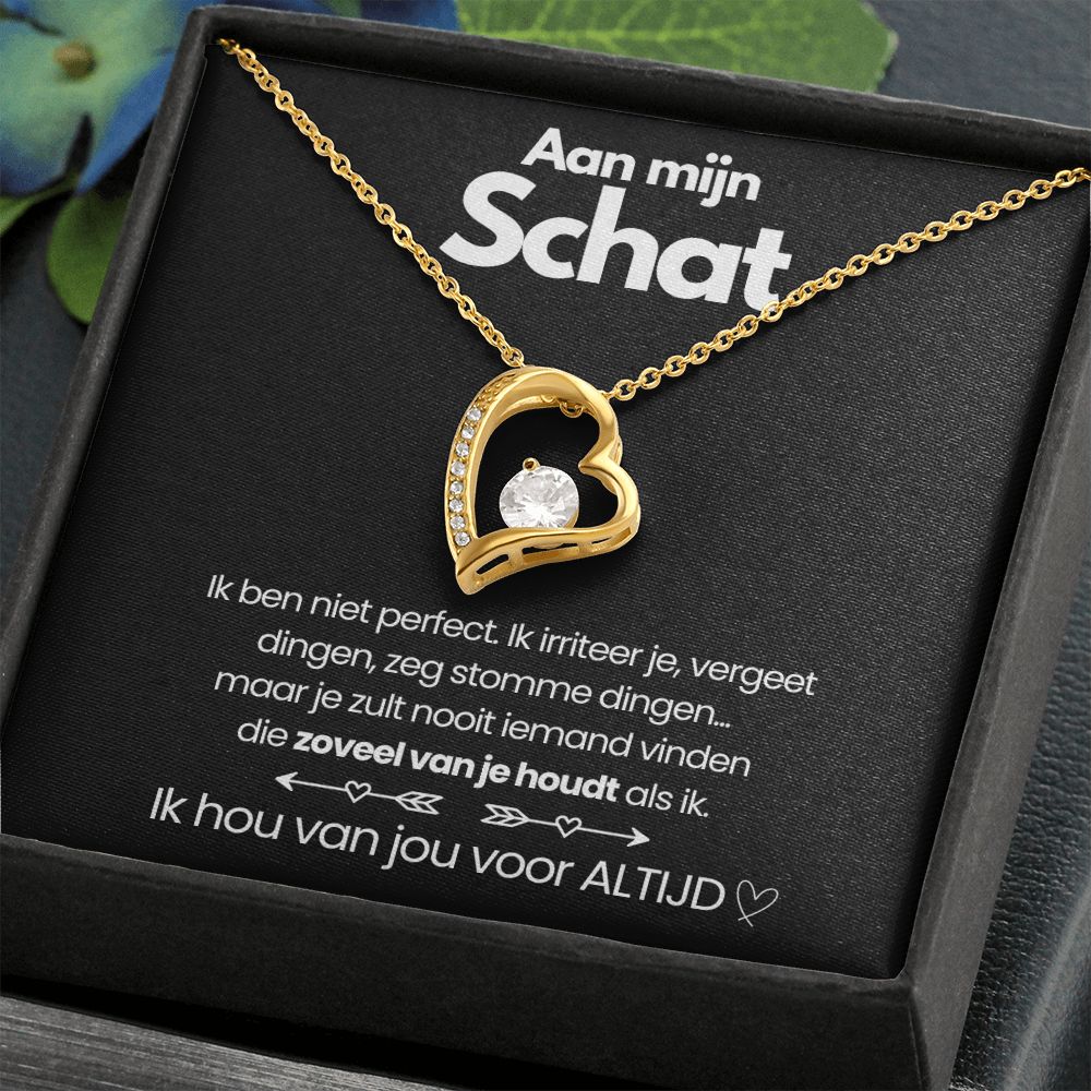 Delicate gold finish necklace with a radiant heart zirconia pendant for her. Stylish women's gift.