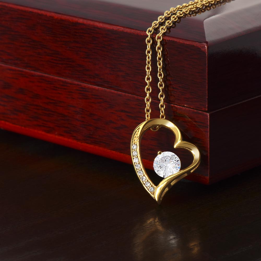 Special occasion gold finish heart zirconia pendant necklace. Beautiful women's jewelry gift.