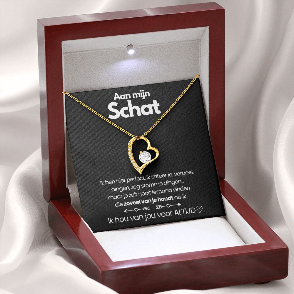 Stylish gold finish heart zirconia pendant necklace for women's everyday wear. Elegant accessory.
