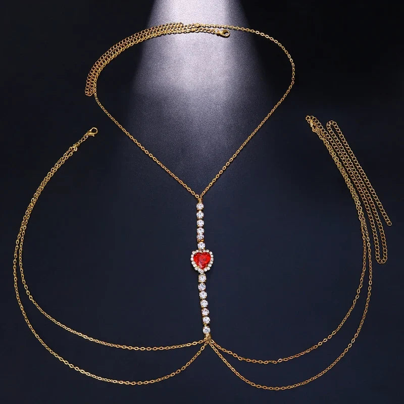 Sparkling rhinestone heart chest chain, women's statement body jewelry, perfect for evening wear.