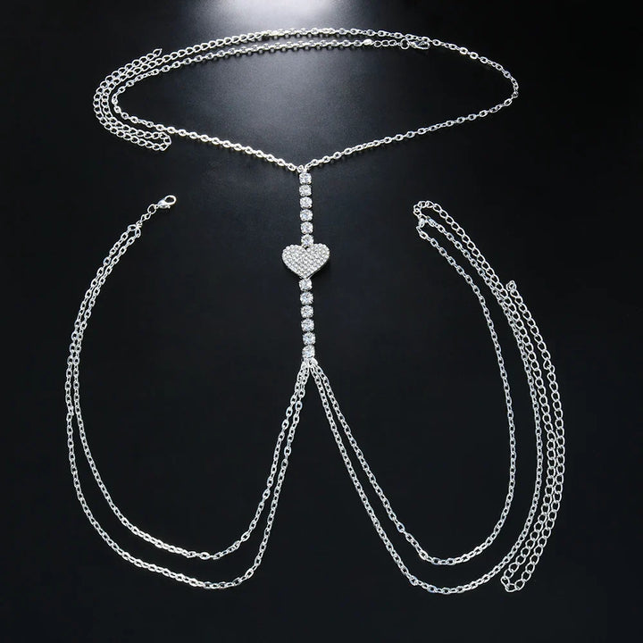 Gold women's heart rhinestone body chain, dazzling chest jewelry, trendy fashion accessory.