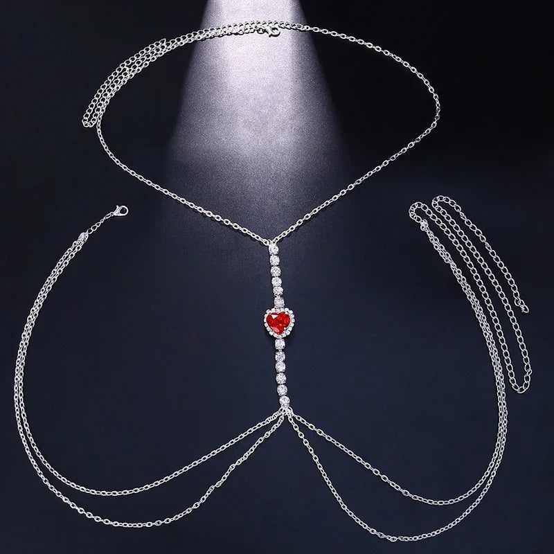 Women's elegant heart rhinestone body chain, dazzling chest jewelry, chic fashion accessory.