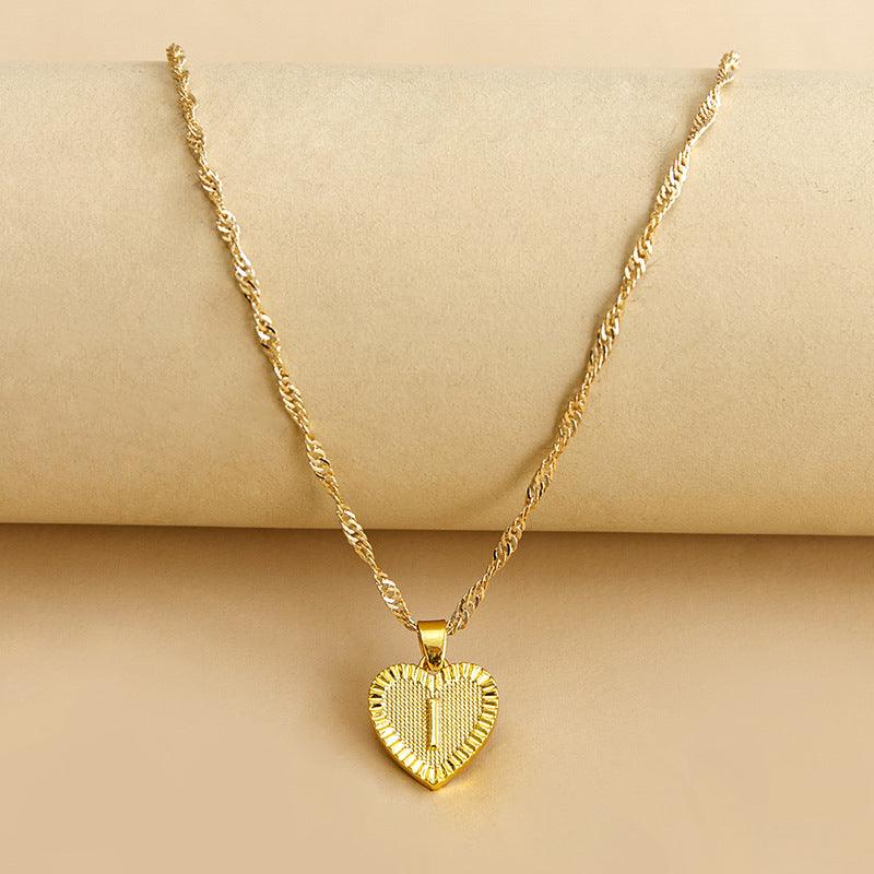 Delicate gold heart initial pendant necklace, elegant personalized gift for her.