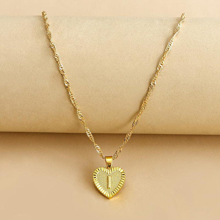 Delicate gold heart initial pendant necklace, elegant personalized gift for her.