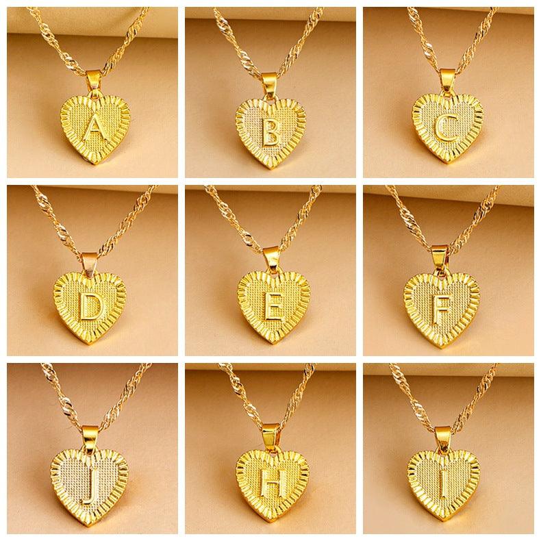Custom gold heart necklace with initial, perfect personalized gift for her.