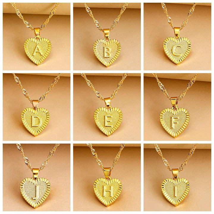 Custom gold heart necklace with initial, perfect personalized gift for her.