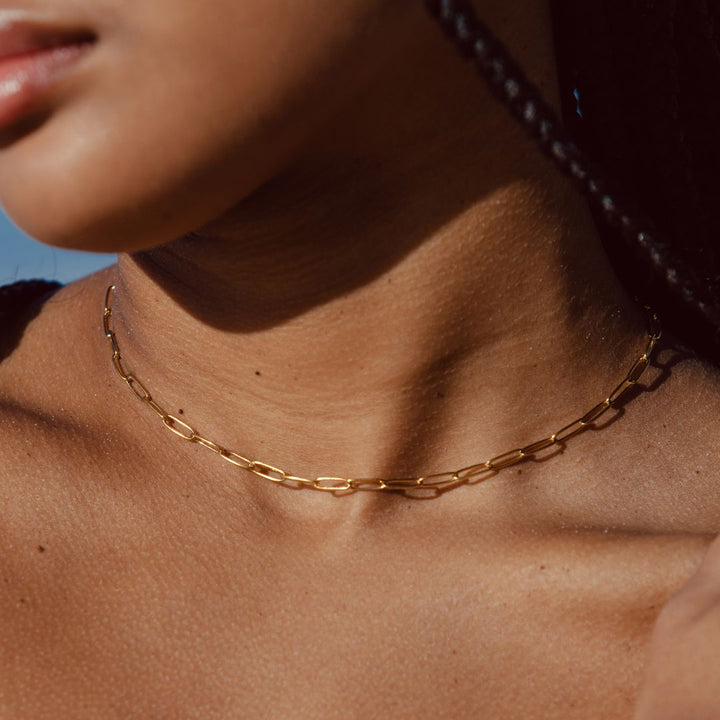 Sleek silver paperclip adjustable choker necklace for women. Hypoallergenic and waterproof design.