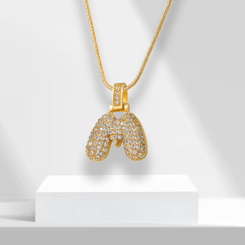 Women's initial 'K' bubble letter pendant, gold plated and encrusted with shining zirconia.