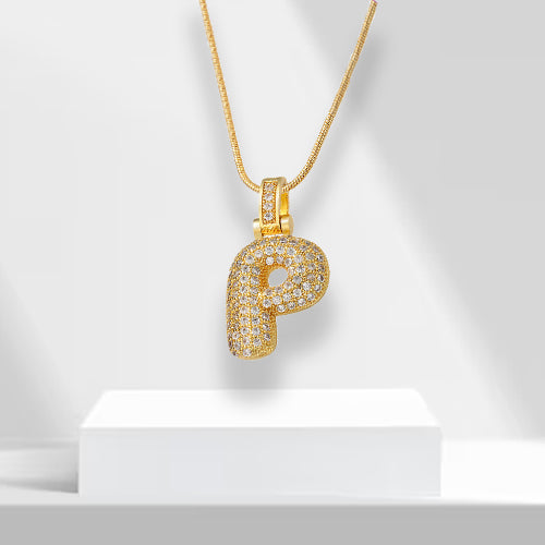 Luxurious women's bubble letter initial necklace, gold plated with sparkling zirconia. Statement piece.