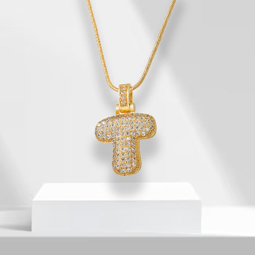 Women's gold plated initial 'J' bubble letter necklace, a glamorous and trendy fashion accessory.