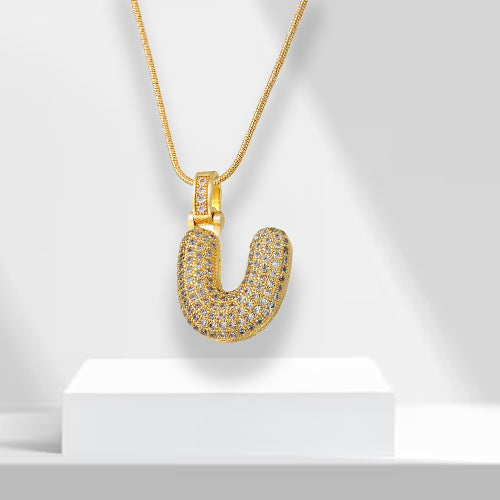 Fashion-forward bubble letter necklace, gold plated for women, showcasing brilliant zirconia.