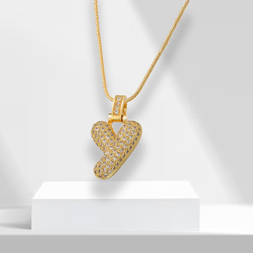 Gold plated women's bubble letter pendant with shimmering zirconia, a chic initial necklace.