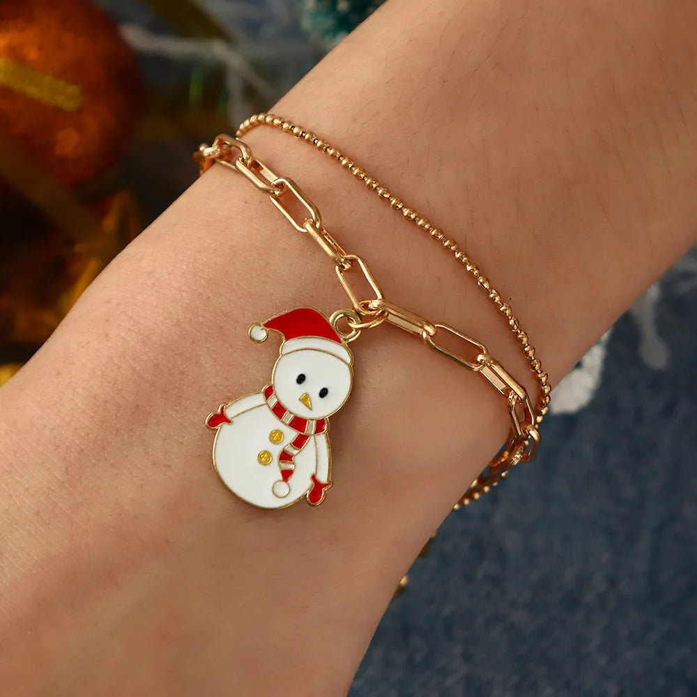 Australian Christmas charm bracelet, gold-plated, enamel, perfect holiday gift for women.
