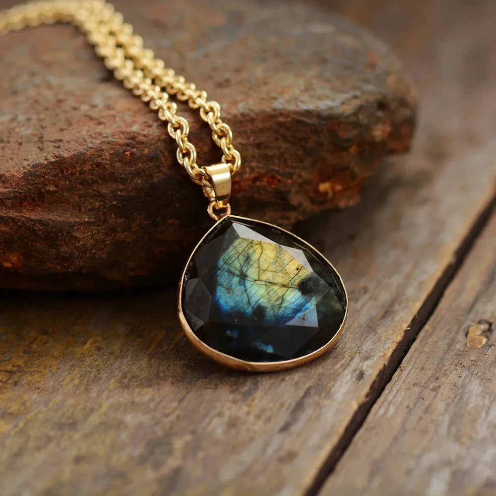 Women's gold plated labradorite drop necklace. Elegant boho gemstone pendant for spiritual protection.